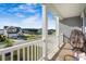 Inviting front porch with scenic neighborhood views and a comfortable egg chair at 242 Bering Ln, Summerville, SC 29486
