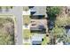 Aerial view of a home featuring solar panels and a well-maintained lawn in a suburban neighborhood at 2598 Spivey Ct, North Charleston, SC 29406