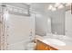 Bathroom with tub-shower combo, single sink vanity, and neutral color scheme at 2598 Spivey Ct, North Charleston, SC 29406