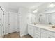 Bathroom featuring a double vanity, granite countertop, and walk-in shower at 3000 Flat Rock Ln, Ridgeville, SC 29472
