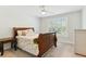 Bedroom features a wood bedframe, bedside tables and neutral colors at 3000 Flat Rock Ln, Ridgeville, SC 29472