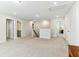 Bright upstairs bonus room with carpet and multiple doorways at 3000 Flat Rock Ln, Ridgeville, SC 29472