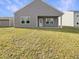 Home showcasing a large backyard with newly installed green grass at 307 Sedona Dr, Summerville, SC 29486