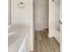 Bright bathroom featuring a white vanity and wood-look tile floors at 307 Sedona Dr, Summerville, SC 29486