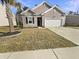 Charming single-Gathering home with a well-manicured lawn, two car garage, and classic design at 307 Sedona Dr, Summerville, SC 29486