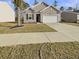 Charming single-Gathering home with tidy landscaping, a two-car garage, and a welcoming curb appeal at 307 Sedona Dr, Summerville, SC 29486