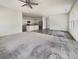 Open-concept living area boasts wood flooring and carpet, connecting to the modern kitchen with stainless appliances at 307 Sedona Dr, Summerville, SC 29486