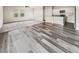 Open-concept living area boasts wood flooring and lots of natural light, connects to the spacious kitchen at 307 Sedona Dr, Summerville, SC 29486