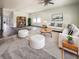 Open living room with hardwood floors, modern decor, and large windows for ample natural light at 307 Sedona Dr, Summerville, SC 29486
