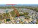 Aerial view of home situated on a picturesque pond with an expansive view of the neighborhood at 3668 Maidstone Dr, Mount Pleasant, SC 29466