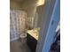 Bathroom featuring a sleek vanity, a toilet, and a shower/tub with a stylish curtain, and ample lighting at 3668 Maidstone Dr, Mount Pleasant, SC 29466