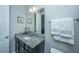 Bathroom with granite vanity top, decorative mirror and soft, neutral colors at 3668 Maidstone Dr, Mount Pleasant, SC 29466
