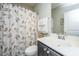 Bright bathroom with a patterned shower curtain, vanity, and towel rack at 3668 Maidstone Dr, Mount Pleasant, SC 29466