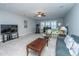 Large bonus room with TV, bed, couch, exercise machine, and ceiling fan at 3668 Maidstone Dr, Mount Pleasant, SC 29466