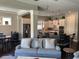 Open concept living room and kitchen area with stainless steel appliances at 3668 Maidstone Dr, Mount Pleasant, SC 29466