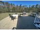 Paver patio features outdoor dining, grilling, and peaceful water views at 3668 Maidstone Dr, Mount Pleasant, SC 29466