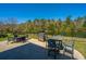 Back patio featuring a grill, outdoor dining and seating, with peaceful water views at 3668 Maidstone Dr, Mount Pleasant, SC 29466