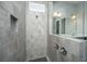 Modern tiled shower featuring built-in niche, handheld sprayer, and sleek fixtures at 3668 Maidstone Dr, Mount Pleasant, SC 29466