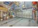 Spacious garage with organization racks, work space, and two garage doors at 401 Waring St, Summerville, SC 29483