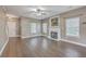 Bright living room with hardwood floors, a cozy fireplace, recessed lighting, and an open layout at 401 Waring St, Summerville, SC 29483