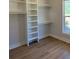 Walk-in closet featuring custom shelving for ample storage at 407 Sandridge Acres Trl, Holly Hill, SC 29059