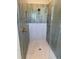 Modern shower with stylish tiling and a rainfall showerhead at 407 Sandridge Acres Trl, Holly Hill, SC 29059