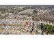 Aerial view of a neighborhood featuring a community lake and established trees at 4237 William E Murray Blvd, Charleston, SC 29414