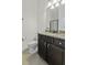 Bathroom featuring granite countertop sink with modern fixtures, a toilet, and tile flooring at 4237 William E Murray Blvd, Charleston, SC 29414