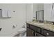 Bathroom showcasing granite countertop sink, modern fixtures, and a toilet at 4237 William E Murray Blvd, Charleston, SC 29414
