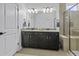 Bathroom featuring a double vanity, framed mirror, and walk-in shower at 4237 William E Murray Blvd, Charleston, SC 29414
