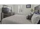 Bedroom showcasing a well-made bed, dresser, and bright natural lighting at 4237 William E Murray Blvd, Charleston, SC 29414