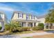 Traditional two-story home with covered porch and neatly manicured landscaping at 4237 William E Murray Blvd, Charleston, SC 29414