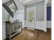 Welcoming foyer with hardwood floors, a decorative mirror, and stylish accents at 4237 William E Murray Blvd, Charleston, SC 29414