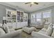 Cozy living room with custom built-ins, plush seating, and bright natural light at 4237 William E Murray Blvd, Charleston, SC 29414