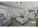 Cozy living room featuring comfortable seating, neutral colors, and a view into the kitchen at 4237 William E Murray Blvd, Charleston, SC 29414