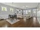 Open floor plan of a living room and dining area with lots of natural light at 4237 William E Murray Blvd, Charleston, SC 29414