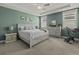Serene main bedroom featuring tray ceilings, ample natural light, and a neutral color palette at 4237 William E Murray Blvd, Charleston, SC 29414