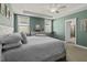 Relaxing main bedroom featuring tray ceiling, natural light, and neutral tones at 4237 William E Murray Blvd, Charleston, SC 29414