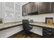 Home office nook with granite countertops, built-in cabinets and natural light at 4237 William E Murray Blvd, Charleston, SC 29414