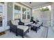 Relaxing screened-in patio offering comfortable seating for outdoor enjoyment at 4237 William E Murray Blvd, Charleston, SC 29414