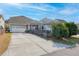 This charming home boasts a screened-in porch and a two-car garage at 4237 William E Murray Blvd, Charleston, SC 29414