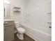 A bathroom featuring a shower and tub combo with tiled wall and a single sink vanity at 4678 Palm View Cir, North Charleston, SC 29418
