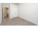 An empty bedroom features neutral carpet, white walls, and a double door closet at 4678 Palm View Cir, North Charleston, SC 29418