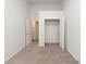 The bedroom has neutral carpet and a closet for plenty of storage space at 4678 Palm View Cir, North Charleston, SC 29418