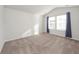 Bright bedroom featuring natural light and carpet flooring at 4678 Palm View Cir, North Charleston, SC 29418