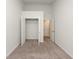 The empty bedroom has neutral carpet and a closet for storage space at 4678 Palm View Cir, North Charleston, SC 29418