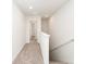 Bright hallway with carpet flooring and white trim at 4678 Palm View Cir, North Charleston, SC 29418
