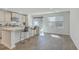 Bright kitchen with a breakfast bar that offers stylish seating and modern appliances at 4678 Palm View Cir, North Charleston, SC 29418