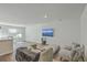 Bright living room with stylish furnishings, a sleek TV, and views of the charming Charleston area at 4678 Palm View Cir, North Charleston, SC 29418