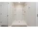 New bathroom features white tiled shower and white trim at 4678 Palm View Cir, North Charleston, SC 29418